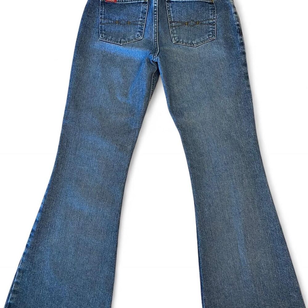Y2k low-rise flared MUDD kidcore jeans.